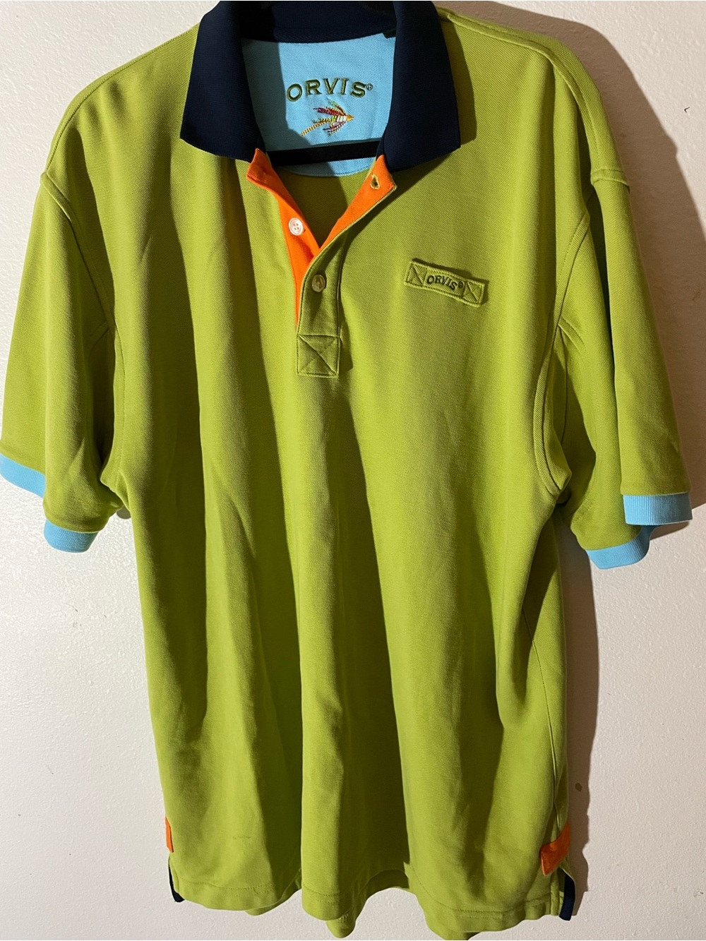 Orvis Lime Green Polo with Navy Collar and Orange Placket Accents
